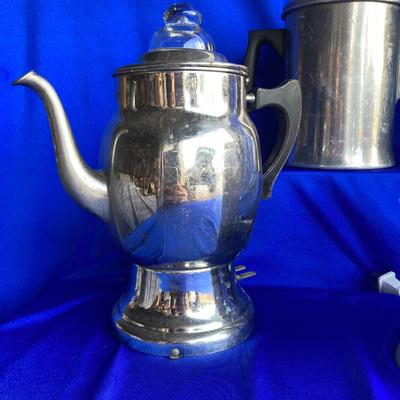 A VARIETY OF VINTAGE COFFEE POTS AND A COFFEE GRINDER TO TRY THEM OUT WITH