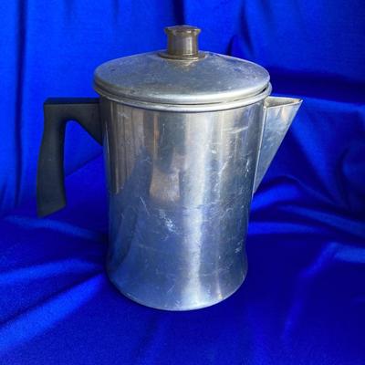 A VARIETY OF VINTAGE COFFEE POTS AND A COFFEE GRINDER TO TRY THEM OUT WITH