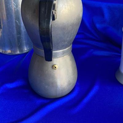 A VARIETY OF VINTAGE COFFEE POTS AND A COFFEE GRINDER TO TRY THEM OUT WITH