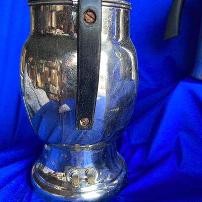A VARIETY OF VINTAGE COFFEE POTS AND A COFFEE GRINDER TO TRY THEM OUT WITH