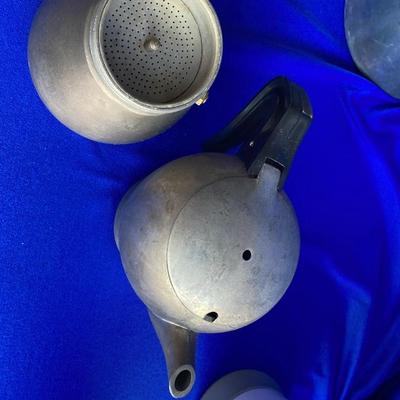 A VARIETY OF VINTAGE COFFEE POTS AND A COFFEE GRINDER TO TRY THEM OUT WITH