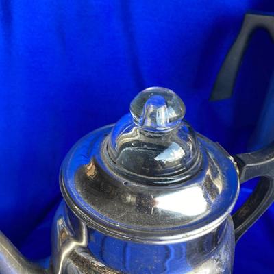 A VARIETY OF VINTAGE COFFEE POTS AND A COFFEE GRINDER TO TRY THEM OUT WITH