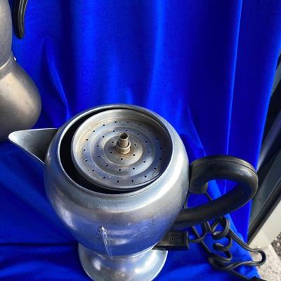 A VARIETY OF VINTAGE COFFEE POTS AND A COFFEE GRINDER TO TRY THEM OUT WITH