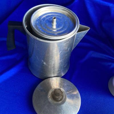 A VARIETY OF VINTAGE COFFEE POTS AND A COFFEE GRINDER TO TRY THEM OUT WITH