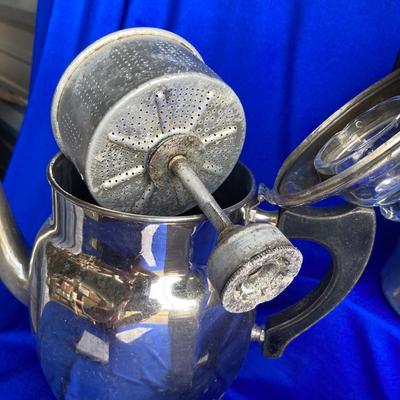 A VARIETY OF VINTAGE COFFEE POTS AND A COFFEE GRINDER TO TRY THEM OUT WITH