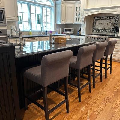 Four gray fabric stools