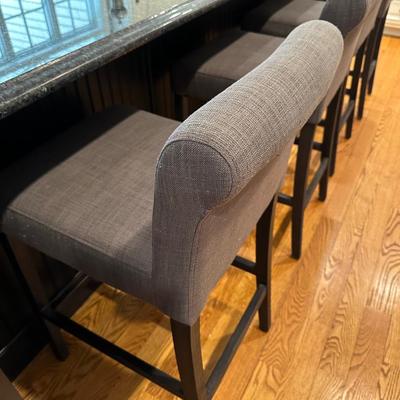 Four gray fabric stools