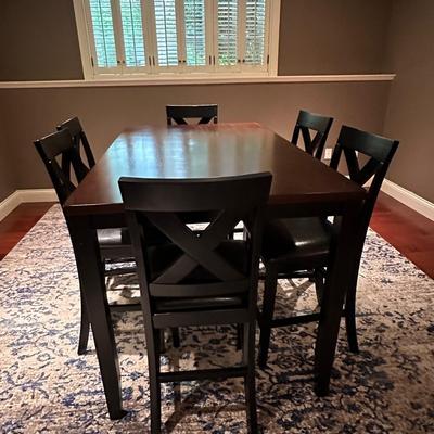 Pub table and six leather chairs