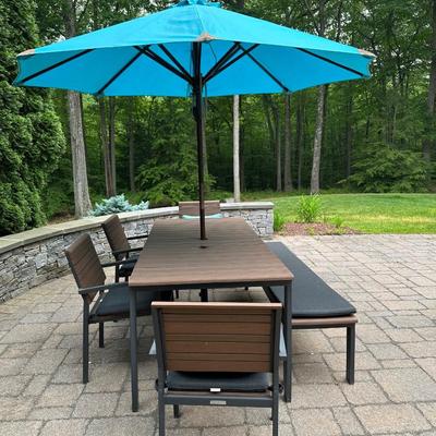 Crate & Barrel outdoor table, four chairs and bench with umbrella