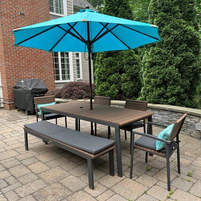 Crate & Barrel outdoor table, four chairs and bench with umbrella