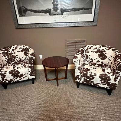 Two animal print fabric club chairs