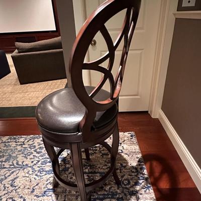 Set of four beautiful swivel leather stools