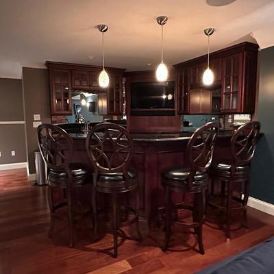 Set of four beautiful swivel leather stools