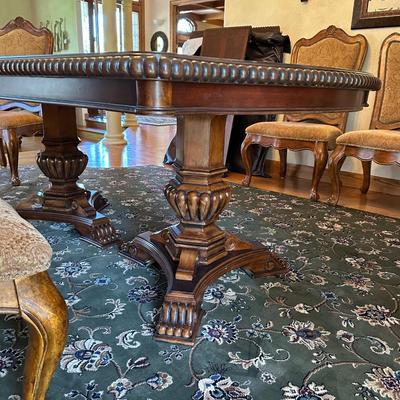 GORGEOUS DINING ROOM TABLE W/10 CHAIRS, 2 LEAVES & PROTECTIVE PADS