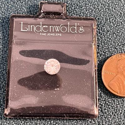 FOUND THIS JEWEL- DONâ€™T KNOW WHAT IT IS- FAKE DIAMOND? CZ?