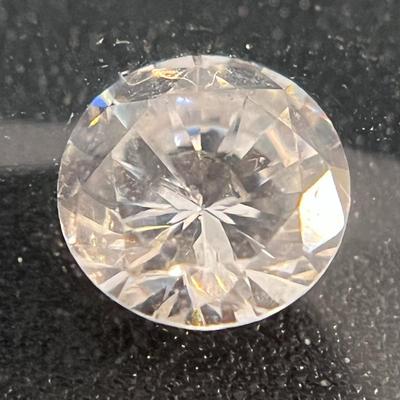 FOUND THIS JEWEL- DONâ€™T KNOW WHAT IT IS- FAKE DIAMOND? CZ?