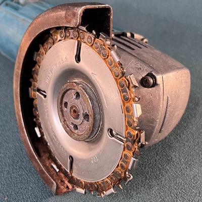 ROUGH CUT ELECTRIC HAND HELD ROTARY SAW w/CHAINSAW-LIKE BLADE