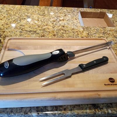LARGE, THICK WOODEN CUTTING BOARD AND AN OSTER ELECTRIC KNIFE