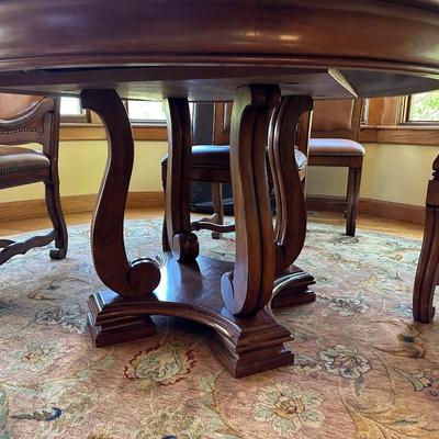 SOLID WOOD DINING TABLE WITH 1 LEAF AND 5 WOOD FRAMED LEATHER CHAIRS