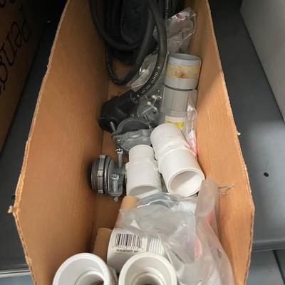 Shelf of Plumbing Components - 3 Boxes