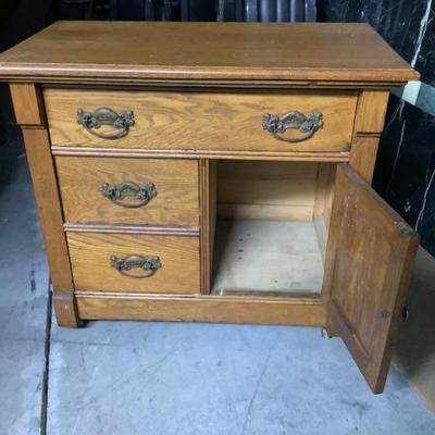Small wooden dresser on casters,with divider drawer, 3 drawers, 1 door, dove tail, great hardware 33â€L 29â€H 19â€W
