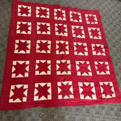 Vintage quilt with hand sewing