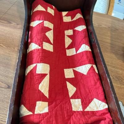 Vintage quilt with hand sewing