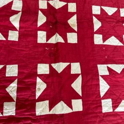 Vintage quilt with hand sewing