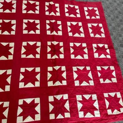 Vintage quilt with hand sewing