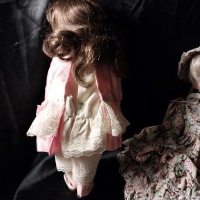 TWO HAND MADE DOLLS AND HAND SEWN CLOTHES