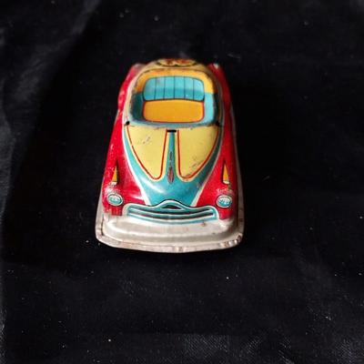TWO VINTAGE TIN CARS