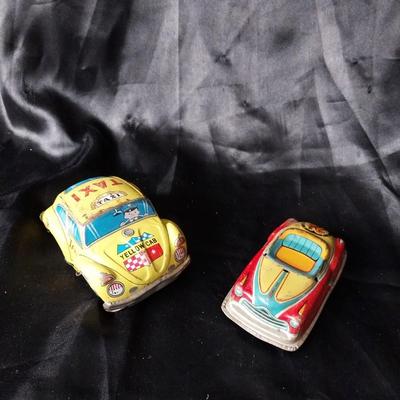 TWO VINTAGE TIN CARS