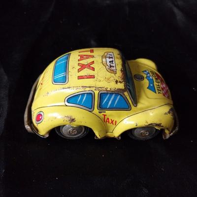 TWO VINTAGE TIN CARS