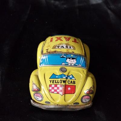 TWO VINTAGE TIN CARS