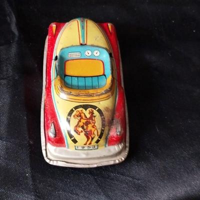 TWO VINTAGE TIN CARS