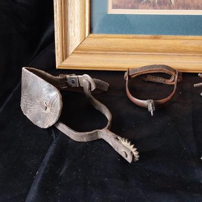 VINTAGE SPURS AND FRAMED WESTERN ARTWORK "STORM CLOUDS ARE BUILDING"