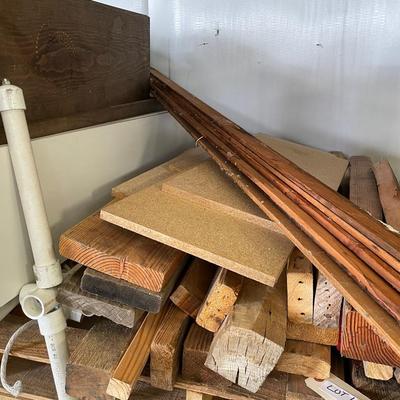 Pallet Full of various pieces of lumber - shelf boards some short 2x4s