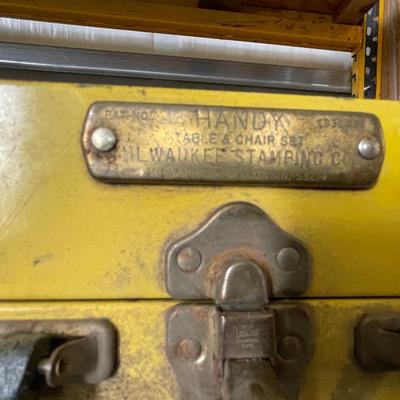 Handy yellow metal folding picnic/outdoor table in box