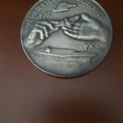 Two naval 50th anniversary coins