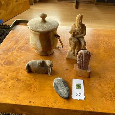 Collection of various stone and resin items