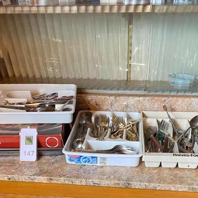 Lot of flatware and kitchen implements