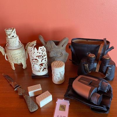 Collection of carved bone pieces.