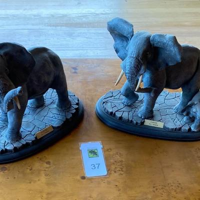 2 elephant sculptures by J Noble