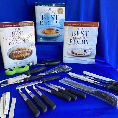 A BRAND NEW SET OF GINSU KNIFES, COOK BOOKS AND SOME OTHER UTENSILS