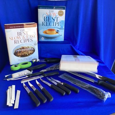 A BRAND NEW SET OF GINSU KNIFES, COOK BOOKS AND SOME OTHER UTENSILS