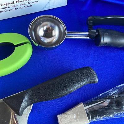 A BRAND NEW SET OF GINSU KNIFES, COOK BOOKS AND SOME OTHER UTENSILS