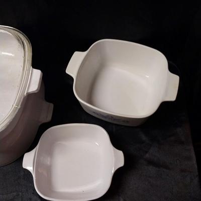FOUR PIECE CORNING WARE BAKING DISHES ONE WITH GLASS LID