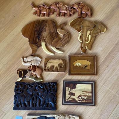 Group wall hangings including elephants