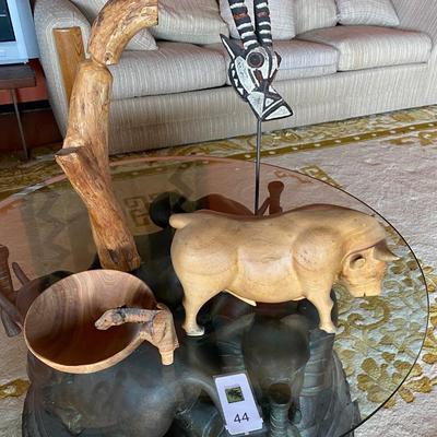 Wood bull, driftwood sculpture, a mask on stand and a giraffe bowl