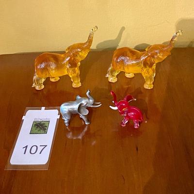 Various colored elephant figurines